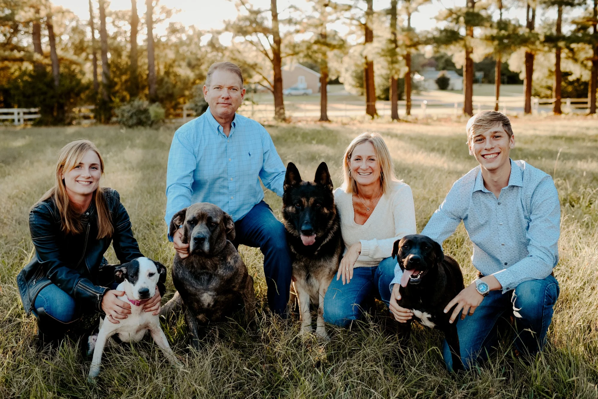 Mark Wasmuth with his wife Meridith, kids, and dogs on their farm in Pittsboro, NC